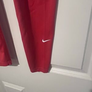 Nike Women’s high rise Red Leggings with White Swoosh Accent